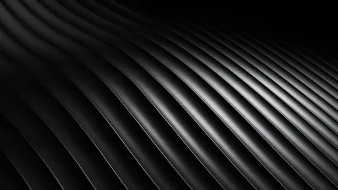 Silver and black ridges curve across the frame in tight, even stripes.