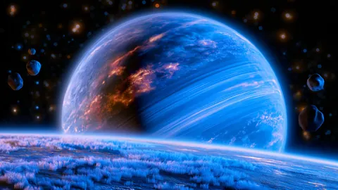 A detailed sapphire ringed planet looms behind a dark foreground body.