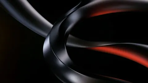 Glossy black ribbons loop through each other, with a streak of ember red catching the light.