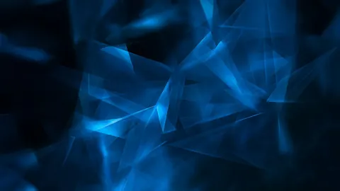 Translucent blue shards overlap in a soft cloud, glowing where the layers cross.