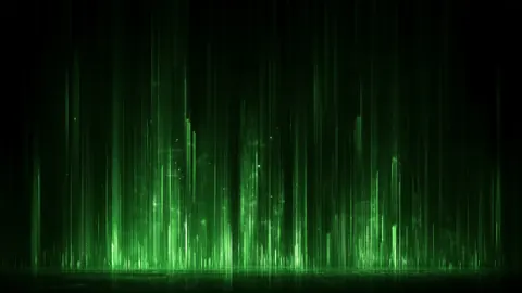 Thin green lines of light fall and flicker over a dark floor, like a curtain of code.