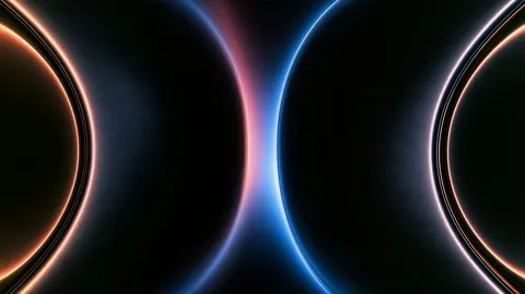Two glowing rings, one warm and one cool, curve toward each other and leave a bright column of light between them.