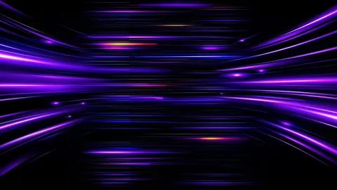 Streaks of violet and pink light stretch across black, like a ship passing through a warp tunnel.