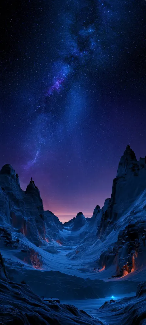 A jagged canyon under a brilliant purple-blue Milky Way.