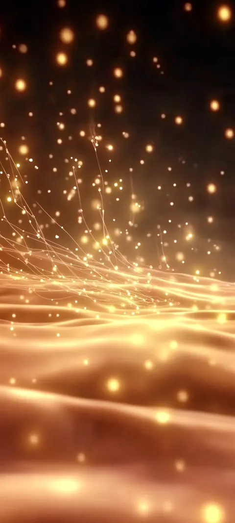 Golden light particles drift above soft, glowing waves of warm sand-colored light.