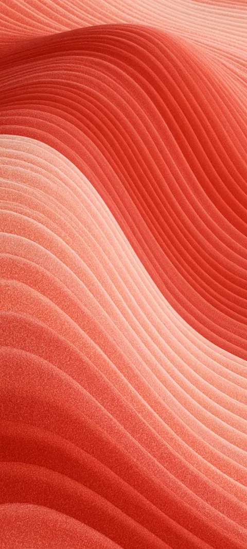 Soft coral and peach waves flow in fine parallel ridges, like layered sand.