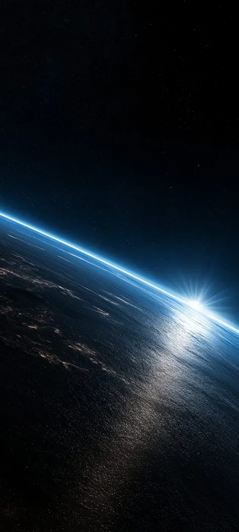 Vast dark upper third for the lock screen — electric horizon and reflected dawn light below.